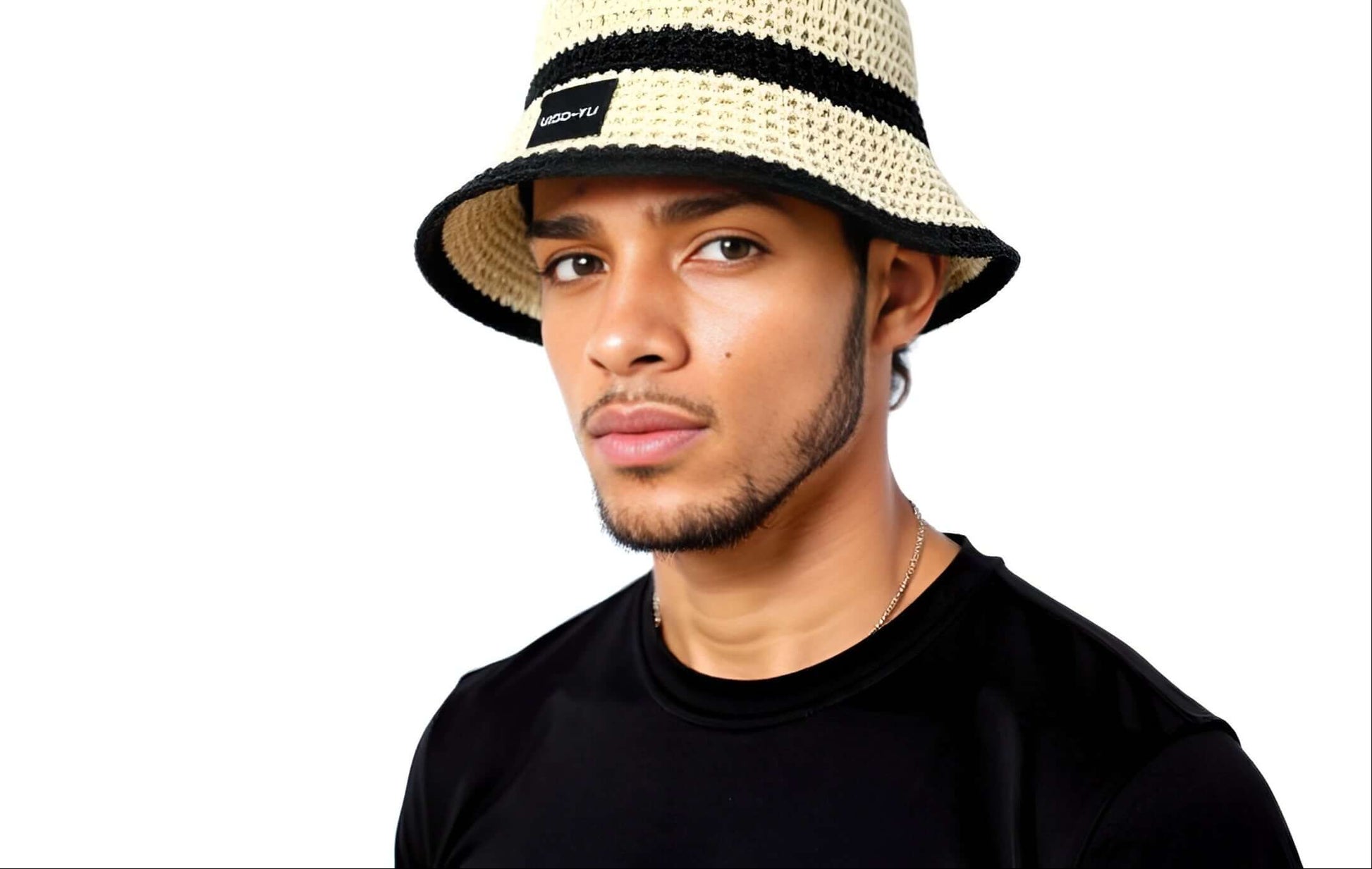 Model wearing a handmade crochet bucket hat, showcasing its stylish design and comfortable fit.